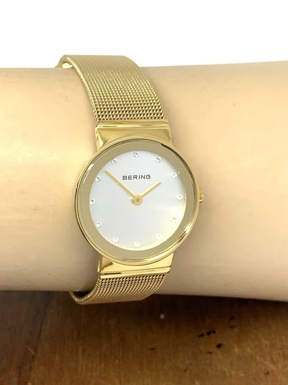 Bering Women's Watch 10126-334 Quartz Silver Dial Gold Tone Stainless Steel 25mm